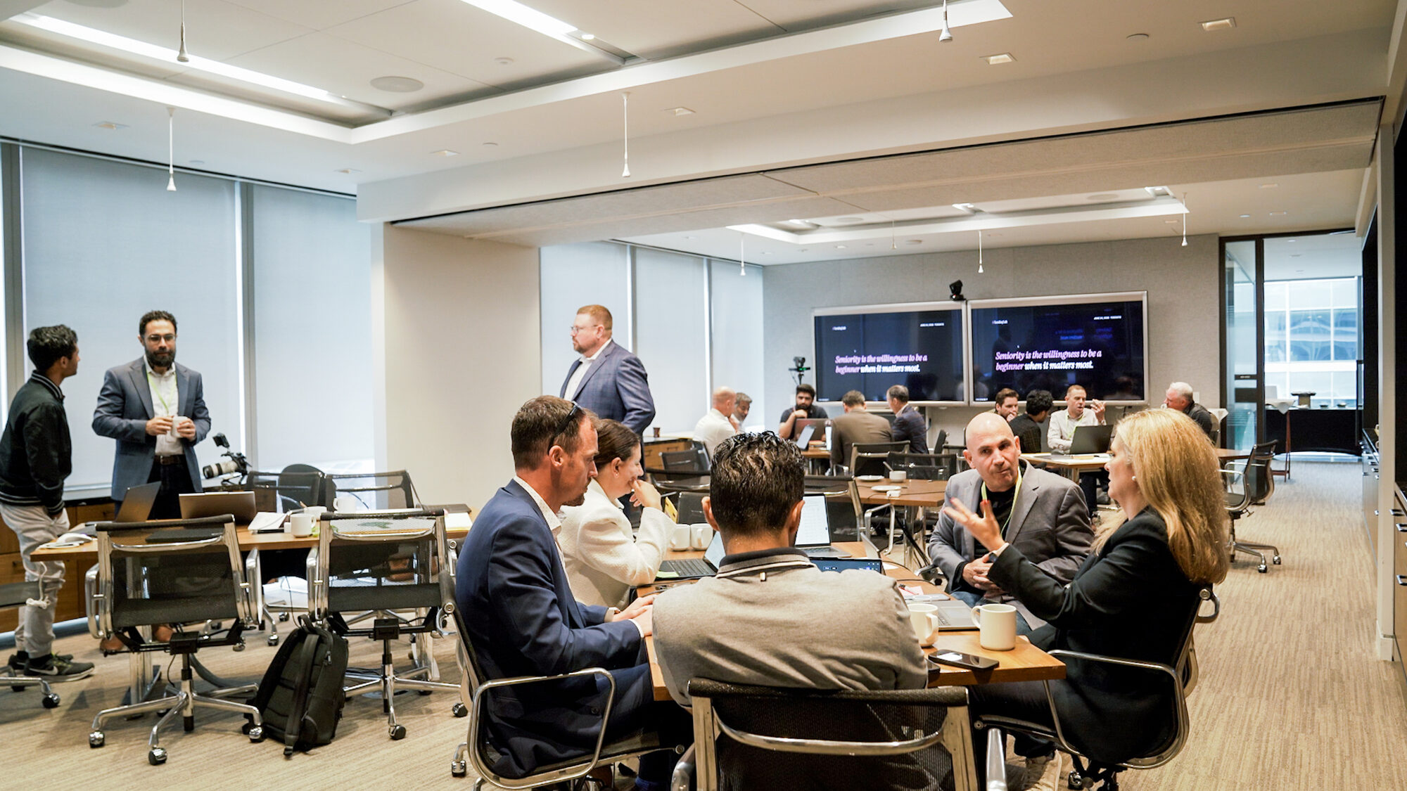 Executives working through AI together
